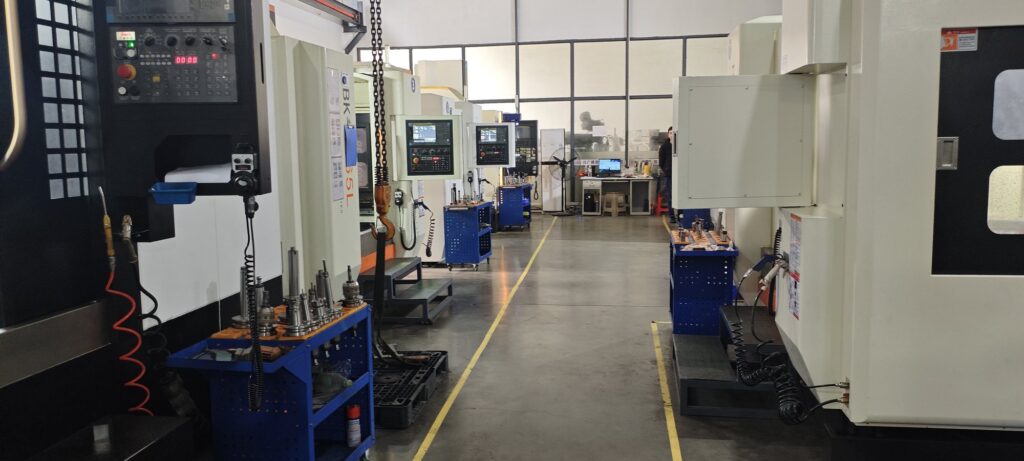 Mold manufacturing shop floor with machining and EDM equipment